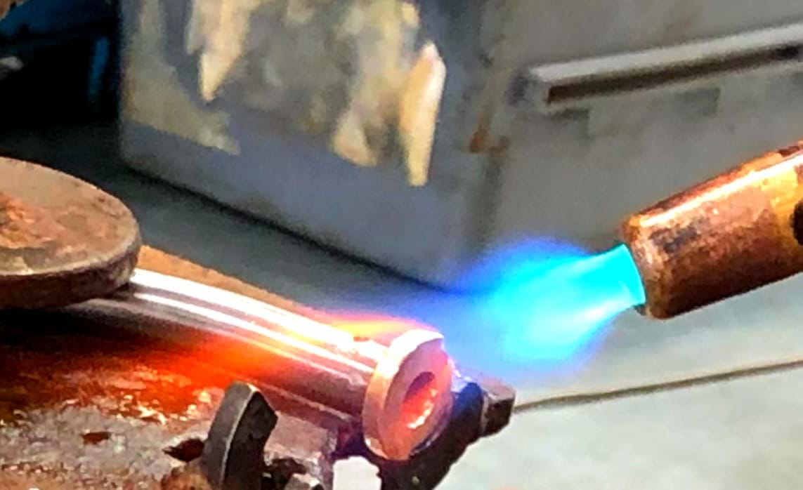 Custom automotive cable manufacture and repair. Flame brazing assembly at Flexible Drive Australia